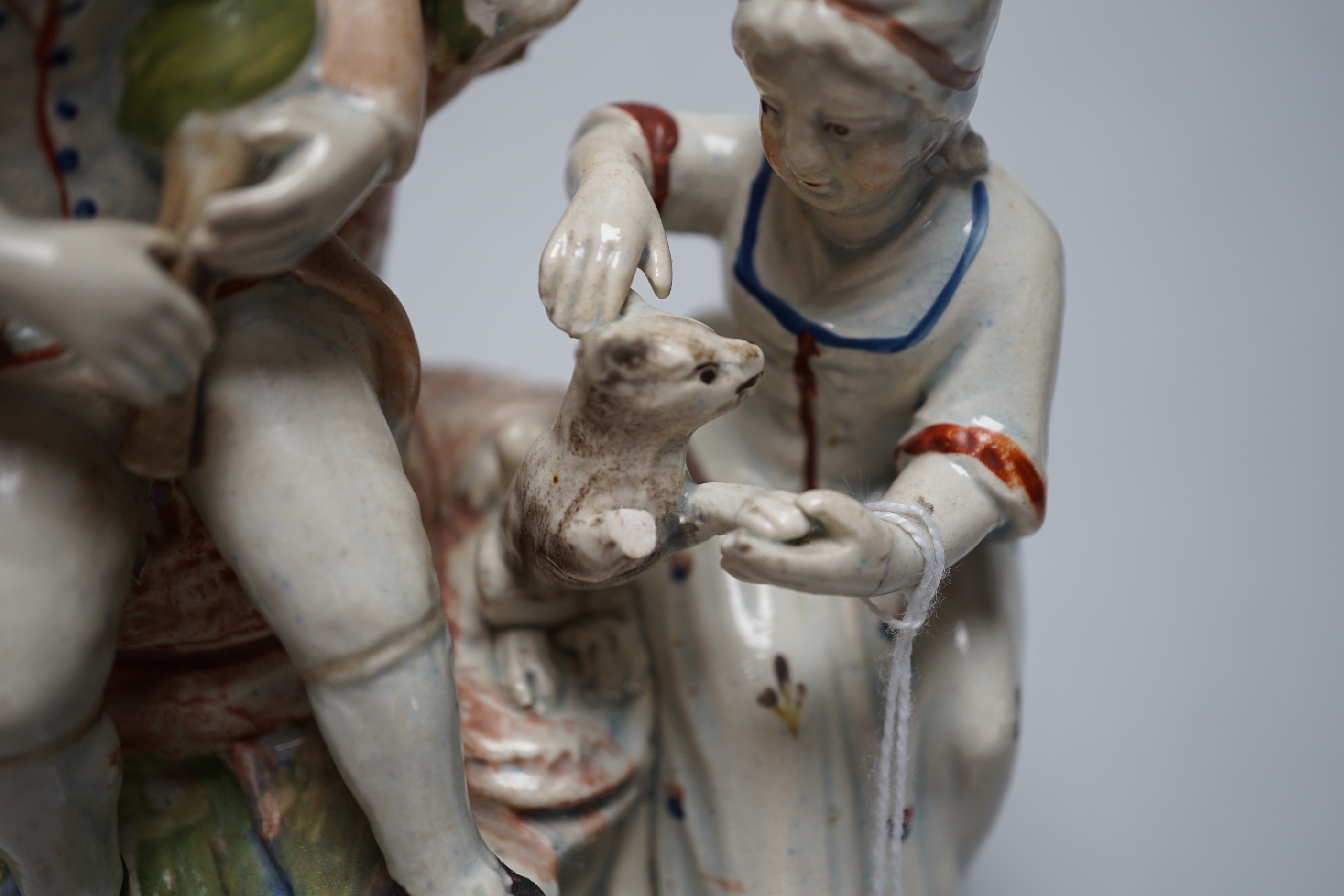 A Walton pearlware figure of a ram, c.1820 and an Enoch Wood type figure group, c. 1800, tallest 19cm